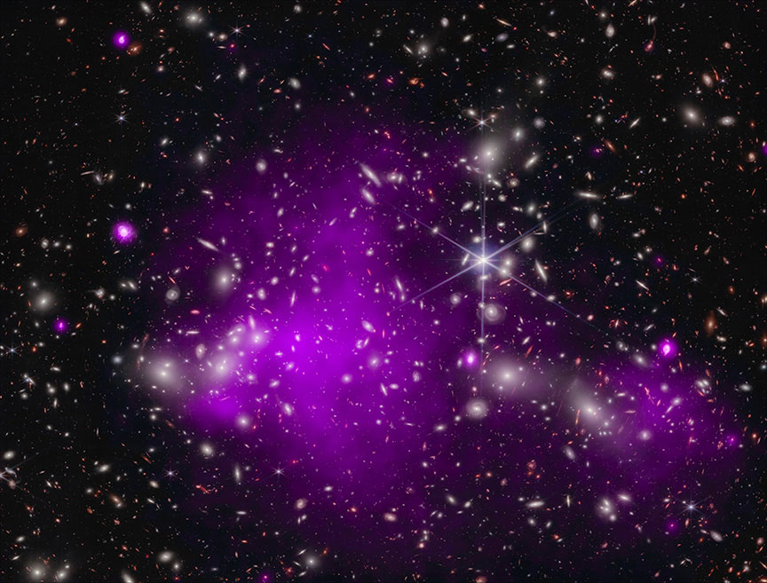 Astronomers found the most distant black hole ever detected in X-rays (in a galaxy dubbed UHZ1) using the Chandra and Webb space telescopes. X-ray emission is a telltale signature of a growing supermassive black hole. This result may explain how some of the first supermassive black holes in the universe formed. These images show the galaxy cluster Abell 2744 that UHZ1 is located behind, in X-rays from Chandra and infrared data from Webb, as well as close-ups of the black hole host galaxy UHZ1.