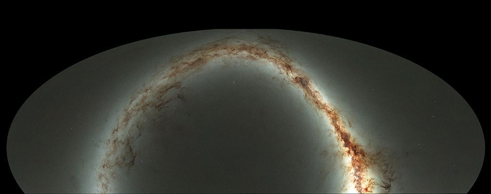 This compressed view of the entire sky visible from Hawai'i by the Pan-STARRS1 Observatory is the result of half a million exposures, each about 45 seconds in length, taken over a period of 4 years. The shape comes from making a map of the celestial sphere, like a map of the Earth, but leaving out the southern quarter. The disk of the Milky Way looks like a yellow arc, and the dust lanes show up as reddish brown filaments. The background is made up of billions of faint stars and galaxies. If printed at full resolution, the image would be 1.5 miles long, and you would have to get close and squint to see the detail.